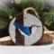 A hand-painted white-breasted nuthatch on a 3.5 inch diameter wood slice Christmas ornament at Cove Creek Photography.